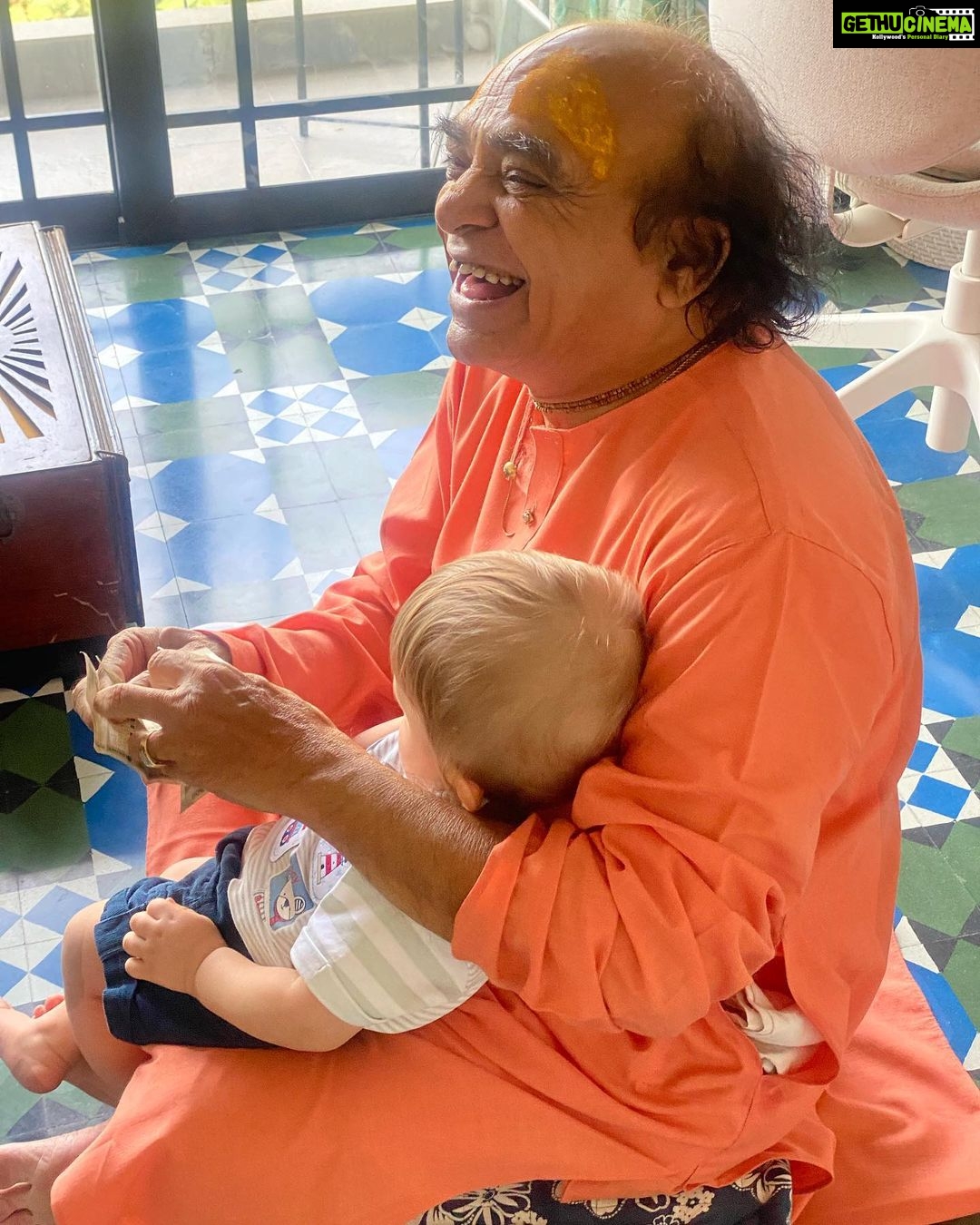Jankee Parekh Instagram - Friday was a special day. I met my guruji after almost 2 years. Thank you, pandemic. But what was even more special was that he held my little Sufi for the very first time. Guruji has been telling me for years ‘Mujhe Nana banaado, Mujhe Nana banaado '. And finally ' Maine unhe Nana bana hee diya 😃😃'! When Sufi laid his eyes on Guruji, he almost instantly latched on to him. He sat so comfortable in his lap, and very attentively listened to every word that he said. Sufi also had his first singing lesson with him where Guruji taught him ‘Sa’ and Sufi in turn showed Guruji all the sounds he can make with his vocal chords :) Sufi’s curious eyes couldn’t get enough of the harmonium. He kept pressing the keys all day and was so happy that Mumma finally got him his first real musical instrument. What can be more special than Sufi getting blessings from my Guru who I have spent half my life with. Guruji now looks forward to coming home more often, not just for me, but also for his grandson, to introduce him to the world of music and share life lessons with him just the way he has has been sharing with his daughter for all these years. #sufiandMaa #singingmama