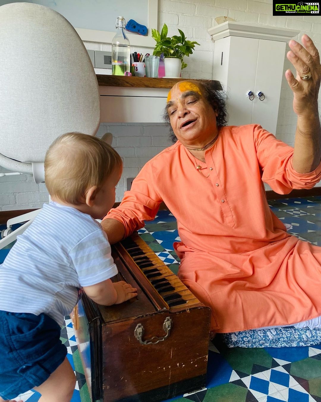 Jankee Parekh Instagram - Friday was a special day. I met my guruji after almost 2 years. Thank you, pandemic. But what was even more special was that he held my little Sufi for the very first time. Guruji has been telling me for years ‘Mujhe Nana banaado, Mujhe Nana banaado '. And finally ' Maine unhe Nana bana hee diya 😃😃'! When Sufi laid his eyes on Guruji, he almost instantly latched on to him. He sat so comfortable in his lap, and very attentively listened to every word that he said. Sufi also had his first singing lesson with him where Guruji taught him ‘Sa’ and Sufi in turn showed Guruji all the sounds he can make with his vocal chords :) Sufi’s curious eyes couldn’t get enough of the harmonium. He kept pressing the keys all day and was so happy that Mumma finally got him his first real musical instrument. What can be more special than Sufi getting blessings from my Guru who I have spent half my life with. Guruji now looks forward to coming home more often, not just for me, but also for his grandson, to introduce him to the world of music and share life lessons with him just the way he has has been sharing with his daughter for all these years. #sufiandMaa #singingmama
