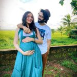 Jankee Parekh Instagram - Through our month long stay in Goa last year (Sept. 2020) I remember only taking photographs chest up as I was 5 months pregnant and we had still not announced it. I remember getting so annoyed with Nakuul because I would never be able to share any of the pictures I had taken simply because of my bump showing. Then one day, whilst we were day-tripping in Dewar island, I told Nakuul, 'Enough is enough, it’s time we just put it out that we are expecting'. And to my surprise, he was like 'Cool, let’s do it.' He stopped the car in the middle of nowhere, got the tripod out of the car, took me right in the middle of these gorgeous fields, put the camera on timer and asked me to pose... And I was like 'Wait, what am I suppose to do?' He asked me to just hold my belly. And just like that we got the photo to announce our pregnancy. It’s only when we got back to our villa, I realised that my chipped nail paint looked horrible in the photograph and I canned the idea of announcing my pregnancy that day. All of next day Nakuul and I went looking for a nail paint remover from one pharmacy to the other, until we finally found one. So that's the story behind why we didn't go with the "Holding Belly in the Green Fields with the messed up Nails" photo... Sounds a little lame right now, but my pregnancy hormones dint make me feel that way... Now that I have a child, it’s made me realise that chipped nail paint is the most non existential crisis one can even imagine amidst a plethora of real ones... Did any of you ever go through such frivolous drama while being preggers and your partner played along? #motherhood #firsttimemom #pregnancydays #goadiaries #babymoon
