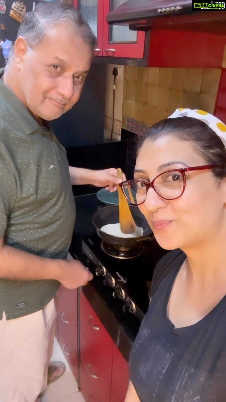 Juhi Parmar Instagram - The season of kites and of delicious til ki mithai is here. For us at home, every year my Papa makes Til Ki Barfi and so this time rather than me doing the cooking, I’m going to show you how its done at the Parmar household as its papa who takes over the kitchen! Recipe- 2 cup safed til Dry roast it and then just coarse grind it. Roast 1.5 cup khoya Mix til and khoya Make sugar syrup by adding 1.5 water to 1.5 cup sugar. When it looks sticky its ready. Add that too to the til mixture Spread ghee in any plate and spread the mixture. Garnish with grated coconut. Cut it in any shape of your choice. Enjoy it! #Makarsankranti #tilladoos #cookingwithjuhi #family #cooking #mithai #reels #reelsinstagram #reelsvideo #reel