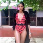 Lopamudra Raut Instagram - Can I ?? Makeup and hair by - @nilamkenia styled by - @mahekksutaria @styledbynikinagda assisted by - @shehjan26 @angelcroshet_swimwear @ikichic_official @goldenswancountryclub #rain #swimwear #fashion #reels #instagram #wethair #look #drake #bondgirl #moments