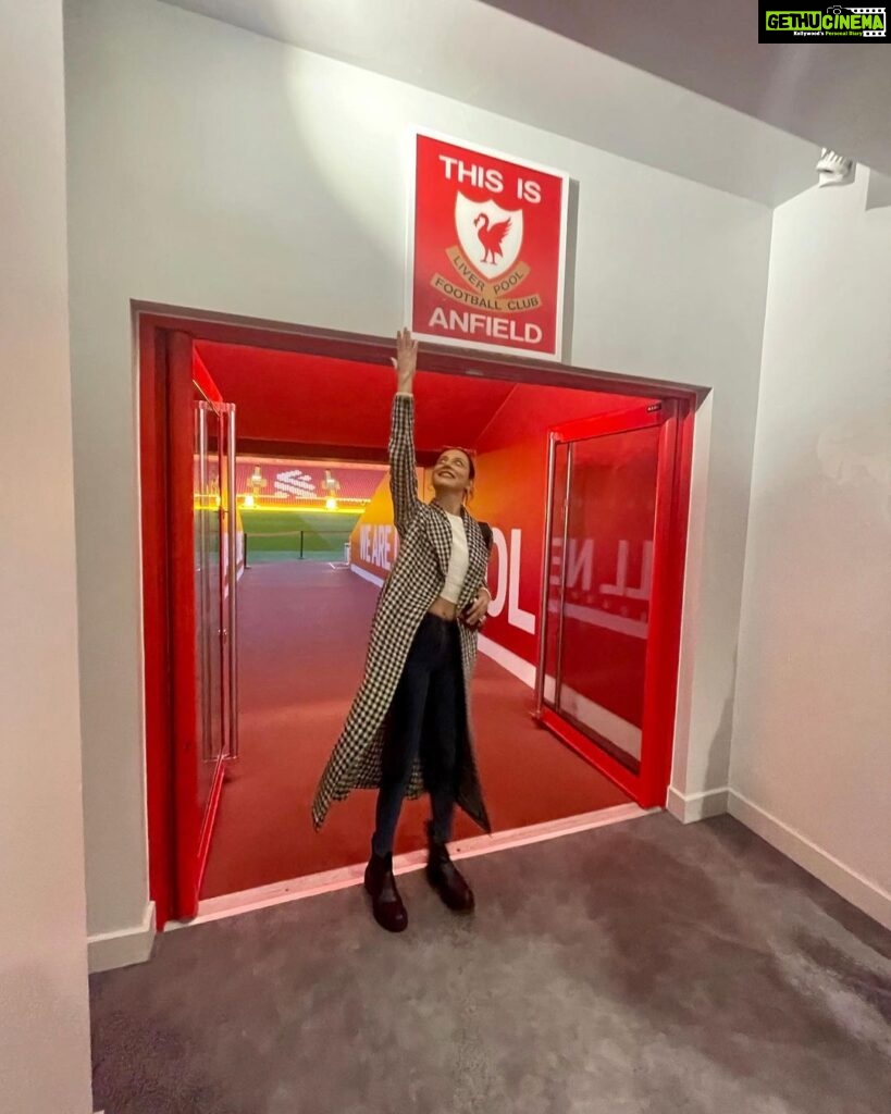 Madhurima Roy Instagram - Live from Anfield❤️ .. A day I dreamt of, joked with my friends, about being there someday, right there with my favourite team playing, soaking in that atmosphere, the dressing room, everything about it, was so magical. I still can’t believe I made it here. This is Anfield, and “You’ll never walk alone” A match to be witnessed live slowly but surely 🤞 Bucket list. Check ✅ Continuing to dream 💭 ❤️ .. #ynwa #liverpoolfc #fangirling Anfield, Liverpool