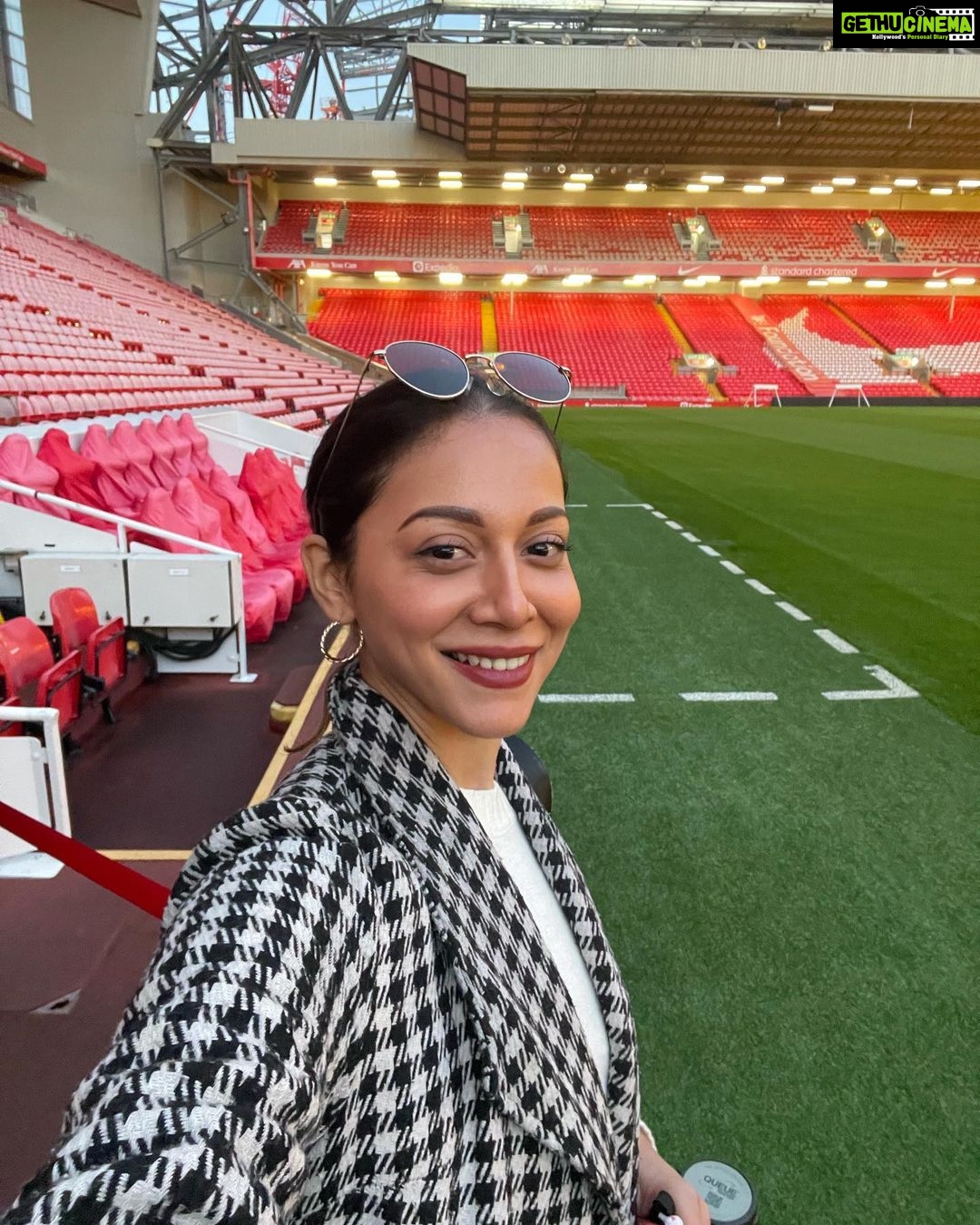 Madhurima Roy Instagram - Live from Anfield❤️ .. A day I dreamt of, joked with my friends, about being there someday, right there with my favourite team playing, soaking in that atmosphere, the dressing room, everything about it, was so magical. I still can’t believe I made it here. This is Anfield, and “You’ll never walk alone” A match to be witnessed live slowly but surely 🤞 Bucket list. Check ✅ Continuing to dream 💭 ❤️ .. #ynwa #liverpoolfc #fangirling Anfield, Liverpool