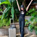 Mandana Karimi Instagram - It's bad manners to keep a vacation waiting. 2️⃣0️⃣2️⃣2️⃣ here I come ✨✈️🎉 Sunglasses- @burberry Sneakers- @adidasindia Bag- @off____white Denims- @zara T-shirt- @karllagerfeld Hat- @xplctstudios Bag -@rimowa #AirportLook #KarlLagerfeld #Goa #Travel #Burberry #Adidas #OffWhite #Goodbye2021