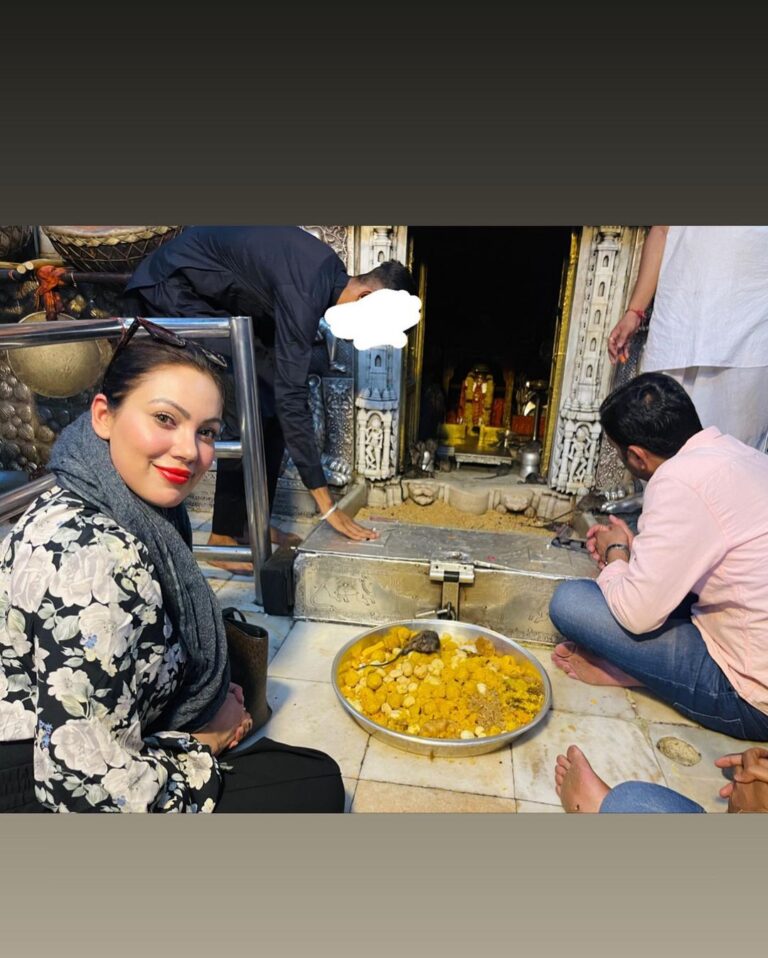 Munmun Dutta Instagram - Last year in May , while visiting Bikaner for an event, I and my team had the divine opportunity to visit Karni Mata temple in Deshnoke 🙏🏻 The temple is dedicated to Karni Mata, who the locals believe is an incarnation of Goddess Durga, the protective Mother Goddess in Hindu religion. The Karni Mata Mandir is popular for being home to over 25,000 rats that inhabit and freely meander around the temple complex. People from different corners of India and abroad come to witness this astounding spectacle and also bring milk, sweets and other offerings for these sacred beings. This has to be one of the most unique experiences I have had 🙏🏻❤️ . #karnimata #karnimatatemple #rajasthan #munmundutta #divineenergy #templesofindia #hinduism #hindutemple Karni Mata Temple, Deshnok, Bikaner, Rajasthan
