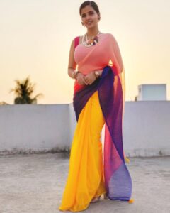 Nanditha Jennifer Instagram - summer glow 
.
.
Beautiful Saree by @sheelai_designs 
Polymer clay Jewellry @abbis_trending_collection 
.
.
#blessed #beautiful #love #cute #yellow #purple #pink #peach #violet #colorful #saree #blouse #actress #jenniferr252 #instagram #instagood #instadaily #sunset #jewellery #polymerclay #pearl #pictureoftheday #likeforlikes #cinema #thankyou #jesus #vijaytv fashionblogger