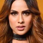Nia Sharma Instagram - Casting a black spell… #DaiyyaDaiyya is out now. @shuraakhan @sankpalsavita Outfit @boutiquobysaachi ❤️ Styled by @stylebysaachivj @ashish_ojha_photography 📸 💯