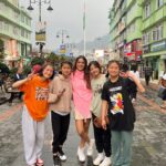 Nia Sharma Instagram - A no-traffic Road … Walked down this beautiful quaint road in the middle of Gangtok.. Bought this cute pink poncho…met some cute lil girls.. danced.. had a Mai Tai at Dragon 🐉 wok .. and everyone kind of knew my name so never felt as if it was a new territory❤️✌️ To such Sweet times…..💕 MG Marg, Gangtok