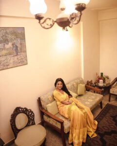 Paoli Dam Instagram - A protracted thought, peeking through the chandelier wanted the bird within to fly, 
The benign numen reminded me of the virtue in fealty, so, why pry!
.
.
.
.
.
#thoughts #life #virtue #lightandbright #introspection #chandelier 
#saree #fashion #yellow #yellowsaree #tradition #traditional #ootd #potd #instagram #instagood #instamood #instafashion #instalove #paolidam #paoli #paolidamofficial