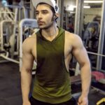 Paras Chhabra Instagram – Lift Heavy until its not heavy anymore.Check out the Olive Hooded Stringer Vest from Fugazee @fugazeeinc #paraschhabra #fugazee #hoody #bodypump #bodybuilding #workout #exerciseroutine #fashion #abs #king #mtv #splitsvilla #ruthless #superman