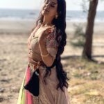 Riya Sharma Instagram - Sand in my toes and saltwater in my curls 🌻 #beachvibes #waterbaby #outfit #ootd #traditionalwear Bhuigaon Beach