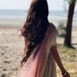 Riya Sharma Instagram - Sand in my toes and saltwater in my curls 🌻 #beachvibes #waterbaby #outfit #ootd #traditionalwear Bhuigaon Beach