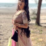 Riya Sharma Instagram - Sand in my toes and saltwater in my curls 🌻 #beachvibes #waterbaby #outfit #ootd #traditionalwear Bhuigaon Beach