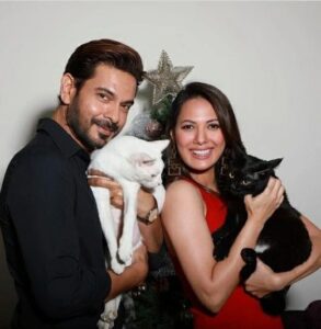 Rochelle Rao Instagram - “At 25, while I was living my showbiz dream in Mumbai, my personal life plummeted. Tired of pointless relationships, I’d almost given up on love, when Keith joined my church group. Coming from the same industry, it didn’t take long for us to become friends; we’d hang out every weekend–I’d think of girls I could set him up with! But soon, I realized that Keith was what I was looking for–sweet, intelligent & serious about love. I fell for him, but he was oblivious–until his birthday, when I went all out with gifts, & he finally got the hint. Days later, while walking me home, he kissed me. That’s how we began dating! The first 2 months of our relationship were hush-hush, until the press spotted us together. Soon after, we got offered Bigg Boss. I told him, ‘I don’t mind, as long as I have you.’ Many thought our relationship was a publicity stunt, but we couldn’t care less! We entered the Bigg Boss house, & it was going well–Keith would even make me coffee everyday. But a few weeks in, he was pulled out overnight; no one told me why. When he finally came back, a month later, I was overjoyed! But finding out his brother had passed away broke my heart! I asked, ‘Why come back?’ & he said, ‘I’d rather mourn with you.’ I thought, ‘If we get through this, we can get through anything.’ By the end of that show, I knew he was the one. But 1 year later, Keith still hadn’t proposed! Once, on my birthday, he was giving me a gift & all my friends took out their cameras–convinced he was going to do it. But he gifted me boots! How anticlimactic! Months later, Keith hinted at a ‘special’ trip. By then, I was done. I burst out, ‘If you’re going to propose, just do it!’ I ranted so much that in the heat of the moment, he said, ‘Fine, if this is the way you want it!’ Then, he got down on one knee, pulled out a ring & asked, ‘Will you marry me?’ It was crazy, but it was SO us! We celebrated with champagne. In 2018, we tied the knot. Our vows were beautiful, & after, we ate dosas & danced with our loved ones. It’s been 4 years since, & we still keep each other on our toes. But he keeps me centered, too! Everyday, I wake up, knowing I’ve Keith’s coffee & smile to look forward to!” Mumbai, Maharashtra