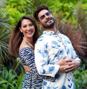 Rochelle Rao Instagram - “At 25, while I was living my showbiz dream in Mumbai, my personal life plummeted. Tired of pointless relationships, I’d almost given up on love, when Keith joined my church group. Coming from the same industry, it didn’t take long for us to become friends; we’d hang out every weekend–I’d think of girls I could set him up with! But soon, I realized that Keith was what I was looking for–sweet, intelligent & serious about love. I fell for him, but he was oblivious–until his birthday, when I went all out with gifts, & he finally got the hint. Days later, while walking me home, he kissed me. That’s how we began dating!
The first 2 months of our relationship were hush-hush, until the press spotted us together. Soon after, we got offered Bigg Boss. I told him, ‘I don’t mind, as long as I have you.’ Many thought our relationship was a publicity stunt, but we couldn’t care less!
We entered the Bigg Boss house, & it was going well–Keith would even make me coffee everyday. But a few weeks in, he was pulled out overnight; no one told me why. When he finally came back, a month later, I was overjoyed! But finding out his brother had passed away broke my heart! I asked, ‘Why come back?’ & he said, ‘I’d rather mourn with you.’ I thought, ‘If we get through this, we can get through anything.’ By the end of that show, I knew he was the one.
But 1 year later, Keith still hadn’t proposed! Once, on my birthday, he was giving me a gift & all my friends took out their cameras–convinced he was going to do it. But he gifted me boots! How anticlimactic!
Months later, Keith hinted at a ‘special’ trip. By then, I was done. I burst out, ‘If you’re going to propose, just do it!’ I ranted so much that in the heat of the moment, he said, ‘Fine, if this is the way you want it!’ Then, he got down on one knee, pulled out a ring & asked, ‘Will you marry me?’ It was crazy, but it was SO us! We celebrated with champagne.
In 2018, we tied the knot. Our vows were beautiful, & after, we ate dosas & danced with our loved ones. It’s been 4 years since, & we still keep each other on our toes. But he keeps me centered, too! Everyday, I wake up, knowing I’ve Keith’s coffee & smile to look forward to!”