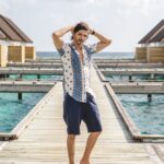 Rohan Mehra Instagram - Villa over the water ✅ Beach outfit ✅ Shades of blue & green palm trees ✅ Perfect island vacay 🌴 . . . @fushifaru @wanderxo_ #fushifaru #fushifarumaldives #feelingfantastic #chicboutique #Funinthesun #maldives Fushifaru Maldives