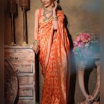 Sana Sayyad Instagram - NAVRATRI:- DAY 7 featuring @sana_sayyad29 as the Modern Indian Goddess where she represents the color ORANGE 🧡 . Shoot Concept & Designed By:- @nehaadhvikmahajan @bridalsbynam . 💄MUA , Hair & Styling :- @nehaadhvikmahajan . 🥻Saree :- @kankatala_ . 💍Jewelery :- @pooja_diamond . 🎥:- @abhay_r_kirti . Makeup :- @maybelline . Managed By :- @allboutcommunication . #sanasayyad #makeup #ootd #nehaadhvikmahajan #makeupbyme💄 #nammakeovers #bride #to #be #bridal #look #bridalmakeupartist #destinationweddingmakeupartist #weddingmakeup #hair #hairstyling #nammakeovers #bollywood #television #makeupartist #mumbai #traveller #all #over #the #globe