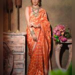 Sana Sayyad Instagram - NAVRATRI:- DAY 7 featuring @sana_sayyad29 as the Modern Indian Goddess where she represents the color ORANGE 🧡 . Shoot Concept & Designed By:- @nehaadhvikmahajan @bridalsbynam . 💄MUA , Hair & Styling :- @nehaadhvikmahajan . 🥻Saree :- @kankatala_ . 💍Jewelery :- @pooja_diamond . 🎥:- @abhay_r_kirti . Makeup :- @maybelline . Managed By :- @allboutcommunication . #sanasayyad #makeup #ootd #nehaadhvikmahajan #makeupbyme💄 #nammakeovers #bride #to #be #bridal #look #bridalmakeupartist #destinationweddingmakeupartist #weddingmakeup #hair #hairstyling #nammakeovers #bollywood #television #makeupartist #mumbai #traveller #all #over #the #globe
