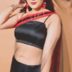 Sapna Choudhary Instagram - A saree silently empowers you …….. 🤨 Saree by @smartcollection8710 #treanding #trendingreels #black #saree #sareelove #loveyourself #lookoftheday #sapnachaudhary #desiqueen #positivity #positivevibes #workhard #thankgodforeverything