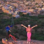 Shenaz Treasurywala Instagram - This 75 year old grandfather does yoga on his cycle every single day on top of this cliff. Khivraj Gurjar aka BMX Yoga Dadu doesn’t take his feet off the cycle, he moves from one pose to the next which is at the end of the cliff. I was having so much anxiety just looking at him do this but he calmly told me to shut up 🤫 😂 and let him do his thing. He has won 🏆 so many awards around the world and has traveled to almost every country to perform his daredevil skill. In fact he was just back from australia when I met him. He says he wants to teach his skill to someone but nobody has been able to learn as yet. Will you be the next bmx yoga dadu? Leave a ❤️ and a comment for dadu! He surely deserves one :)) #yogateacher #yogachallenge #jodhpur #bmx #adventure #cycling Jodhpur - The Blue Heaven