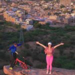 Shenaz Treasurywala Instagram - This 75 year old grandfather does yoga on his cycle every single day on top of this cliff. Khivraj Gurjar aka BMX Yoga Dadu doesn’t take his feet off the cycle, he moves from one pose to the next which is at the end of the cliff. I was having so much anxiety just looking at him do this but he calmly told me to shut up 🤫 😂 and let him do his thing. He has won 🏆 so many awards around the world and has traveled to almost every country to perform his daredevil skill. In fact he was just back from australia when I met him. He says he wants to teach his skill to someone but nobody has been able to learn as yet. Will you be the next bmx yoga dadu? Leave a ❤️ and a comment for dadu! He surely deserves one :)) #yogateacher #yogachallenge #jodhpur #bmx #adventure #cycling Jodhpur - The Blue Heaven