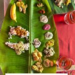 Shenaz Treasurywala Instagram - What’s on my leaf? This is called Sadhya or Feast Menu in Kerala @theleelakovalam Karingali Vellam ( Herbal Water) Karingali is the bark of a tree that is dried and stored . A little bit is put in the water and boiled good for digestion. Salt Balances individual flavors. *Basically to do what a salt is supposed to do.* Rasakadali Pazham Yellow Banana from Kerala eaten at the end of a meal. Sharkara Varaty Jaggery coated banana chips adding sweetness, crunch & munch *like how you all add to my life* Naranga Achar – Lime Pickle Pulli Inji – Ginger and Imli Chutney Nurukku Manga Achar Homemade raw mango pickle Vellerika Pacchadi: Orange Madras cucumber and coconut in a mustard spiked yoghurt gravy Beetroot Pacchadi The sweetness of beetroot and coconut with mustard and homemade yoghurt. Vendakka Kichadi: Fresh cow milk yoghurt, grated coconut, and mustard garnished with deep-fried crunchy okras Kondattam Fried curd chilly. *Probably the best 3 word sentence ever* Kalan Raw plantain, yoghurt and coconut-based gravy that enhances the taste. Avial Medley of vegetables and grated coconut mix. Olan (Pumpkin and Cowpea Curry) A light,mild curry with coconut milk, curry leaves and cowpeas. Olan is said to be the humblest of dishes and a palate cleanser. Chemba Rice Loval rice served hot to start a sadhya Parippu (Dal) Thick dal cooked with coconut & minimal spices Ghee A spoonful in the dal is the best combination Palakkadan Sambar Freshly ground sambar powder and roasted coconut is used in this distinctive Kerala-style Sambar Tomato Rasam Comforting and homey Rasam, perfect for season changes. Pineapple Pullisherry : coconut and yoghurt with the goodness of sweet Pineapples Ada Pradaman: Rice flour batter rolled out on banana leaf like pasta, steamed cut into squares cooked with coconut milk & jaggery Pal Payasam Payasam is slow cooked in cow milk for over two hours in a uruli to get a rose hue and the desired creaminess Gothambu Payasam Broken wheat cooked with milk & Jaggery Sambaram Buttermilk spiced with spices that aid digestion #kovalam #foodporn #foodbaby #travelromancesmiles #onam Kovalam, Kerala