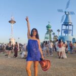 Shenaz Treasurywala Instagram - I am at Coachella Music & Arts Festival which has returned after 2 years because of Covid. Today I want to show you the art at Coachella. Pic 1. I'm standing under La Gaurdian: This one provides strength, protection and love, looking after refugees around the world. Pic 2. Circular Dimensions: Wait till I show you the reel with the 2 DJ making live tracks on either side of the dome. Pic 3. The Mutts: We can learn a lot from dogs- joy, lust for life, loyalty, affection. The dog silhouettes are built with steel frames and filled with a variety of colorful plants- i love this one most because it's recyclable and it has plants growing out of it so it is giving life as well as art!!! Pic 4. The Windmill, The Igloo- this one depicts different cultures and peple, regardless of age or background coming together at the festival. Pic 5. The Playground: provides with four 42- to 56-foot steel towers with benches and piazzas connected by skybridges. It is in the center of Coachella and is a good meeting spot. Pic 6. This seven-story, multi-colored spiral tower known as "Spectra" has been at Coachella since 2018, and we festivalgoers walk the spiral stairway to the viewing deck at the top of the structure for a 360° view of the festival. Pic 7. The Cocoon - imagine when people look up and marvel at a spaceship as it landed. Also imagine music is the common language of communication between the aliens and us. That's what the designer is aiming at over here. Which one is your favourite??? What more do you want to see of Coachella?? #coachella2022 #artfestival #travelromancesmiles #coachellaartandmusicfestival Coachella Music Festival