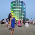 Shenaz Treasurywala Instagram - I am at Coachella Music & Arts Festival which has returned after 2 years because of Covid. Today I want to show you the art at Coachella. Pic 1. I'm standing under La Gaurdian: This one provides strength, protection and love, looking after refugees around the world. Pic 2. Circular Dimensions: Wait till I show you the reel with the 2 DJ making live tracks on either side of the dome. Pic 3. The Mutts: We can learn a lot from dogs- joy, lust for life, loyalty, affection. The dog silhouettes are built with steel frames and filled with a variety of colorful plants- i love this one most because it's recyclable and it has plants growing out of it so it is giving life as well as art!!! Pic 4. The Windmill, The Igloo- this one depicts different cultures and peple, regardless of age or background coming together at the festival. Pic 5. The Playground: provides with four 42- to 56-foot steel towers with benches and piazzas connected by skybridges. It is in the center of Coachella and is a good meeting spot. Pic 6. This seven-story, multi-colored spiral tower known as "Spectra" has been at Coachella since 2018, and we festivalgoers walk the spiral stairway to the viewing deck at the top of the structure for a 360° view of the festival. Pic 7. The Cocoon - imagine when people look up and marvel at a spaceship as it landed. Also imagine music is the common language of communication between the aliens and us. That's what the designer is aiming at over here. Which one is your favourite??? What more do you want to see of Coachella?? #coachella2022 #artfestival #travelromancesmiles #coachellaartandmusicfestival Coachella Music Festival