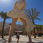 Shenaz Treasurywala Instagram – No mummy, I don’t take pictures of everything! 😜
Welcome to America everyone.
I am standing in front of the Eiffel Tower of Palm Springs.
Forever Marilyn is a 26-ft tall statue of the Hollywood icon Marilyn Monroe in her famous billowing white dress.
Some people from Palm Springs feel it’s good for business as a tourist attraction and some have an issue with placing a large statue that is blocking the beautiful view of the hills and find it obscene, mysoginistic and exploitative.
What is your view on the statue?
Tourist attraction or Exploitation of women?
How would the people of your town react to a statue like this? Accept or Reject?
#marylinmonroe #palmsprings #califórnia #travelromancesmiles Palm Springs, California
