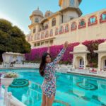 Shenaz Treasurywala Instagram - What are your favourite hotels in India? For me - There's nothing like staying in these Grand Palaces in Rajsthan- modern amenities with an old world charm. This is the pool at the Shiv Nivas Udaipur which is in the City Palace. The Maharana lives here too!!! Should I say hello? ☺️ @shivniwaspalaceudaipur @hrhhotels #traveludaipur #udaipurpalaces #royallife #travelromancesmiles Shiv Niwas Palace - Grand Heritage