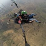 Shivangi Khedkar Instagram – And then there is the whole world  at your feet ! @shambhalabythelake 
#paragliding #fly #mountains #leaveyourproblemsbehind