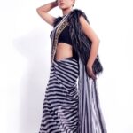 Shruti Sharma Instagram – She stood tall.
With the glory of scars and her demons kneeling at her feet🧚

Outfit:- @boutiquelibrary
Styling:- @sonammbissakunjir
Mua:- @shikhashah_mua
Photographer:- @faizankhan.6
Bags:- @umabagsofficial

#stripes #sareedraping #indianwear #fashiongram #faishon #shrutisharma #styleinspiration