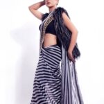 Shruti Sharma Instagram - She stood tall. With the glory of scars and her demons kneeling at her feet🧚 Outfit:- @boutiquelibrary Styling:- @sonammbissakunjir Mua:- @shikhashah_mua Photographer:- @faizankhan.6 Bags:- @umabagsofficial #stripes #sareedraping #indianwear #fashiongram #faishon #shrutisharma #styleinspiration