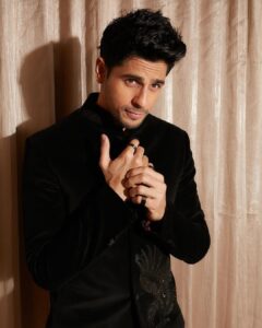 Sidharth Malhotra Instagram - let me distract you 😉

Make up: @rizvan02 
Hair : @ali19rizvi 
Managed by : @parminderelan 

Styled by @mohitrai
Outfit: @rohitbalofficial

Shoes : @jimmychoo
Photography: @kadamajay