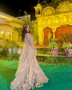 Sneha Bhawsar Instagram - Flaunting my Indian-ness…✨
Happiness is… wearing a lehenga.✨
outfit - @urbandulhaniya 

#weddingoutfits #lehenga #traditionalwear #weddingdress #snehabhawsar #ghumhaikisikeypyaarmeiin #ghkpm #karishma #shadiseason #wedding #weddingseason #bridesmaids