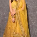 Vahbbiz Dorabjee Instagram - Love this beautiful sunset yellow lehenga that looks gorgeous on all. It has intricate hand embroidery with stunning floral detailing in gold that add an old world charm to the beautiful attire. Shagna Da Vehra strives to achieve perfection in creating masterpieces that are one of a kind and touch your heart. Outfit:- @shagnadavehra_ Makeup & Hair:- @makeupbyvaish Videography:- @ashish_ojha_photography