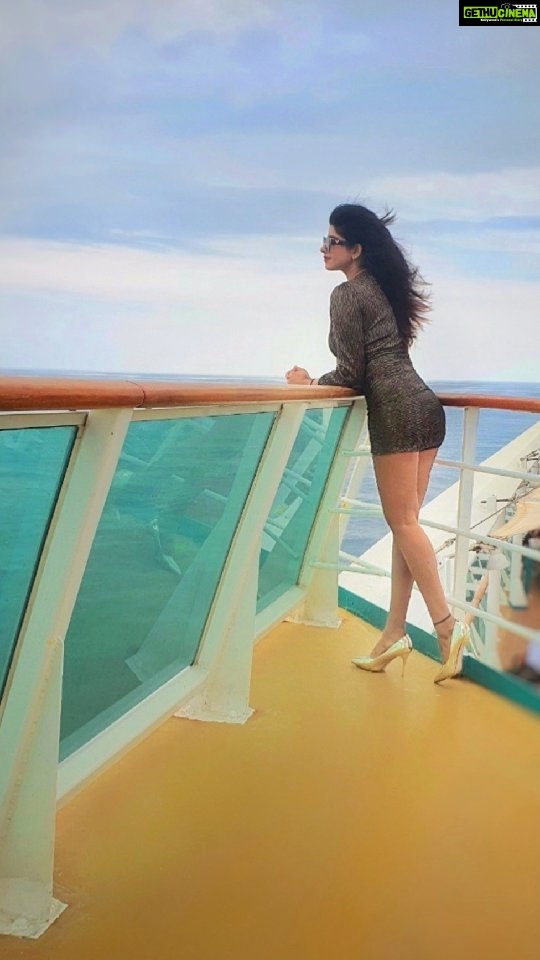 Vindhya Tiwari Instagram - Close your eyes and turn your face into the wind. Feel it sweep along your skin in an visible ocean of exultation 🌊💙 Do u love this song n these seized moments ?? #song #cruising #trendingsongs #breeze #ocean #wind #ship Cordelia Cruise