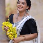 Alphy Panjikaran Instagram - Vishu special 🤗 @3leaf_photography @ar_handlooms_kuthampully @makeover_by_suresh_krishna #vishu #special #neverending #celebration #happiness #malikappurammovie #special #instagram #function #instagood #instagram #instalike #travel #explore #explorepage #travel #travelphotography #instafashion #happy #peace #life #loveyourself #kochi #setsaree #love #lol
