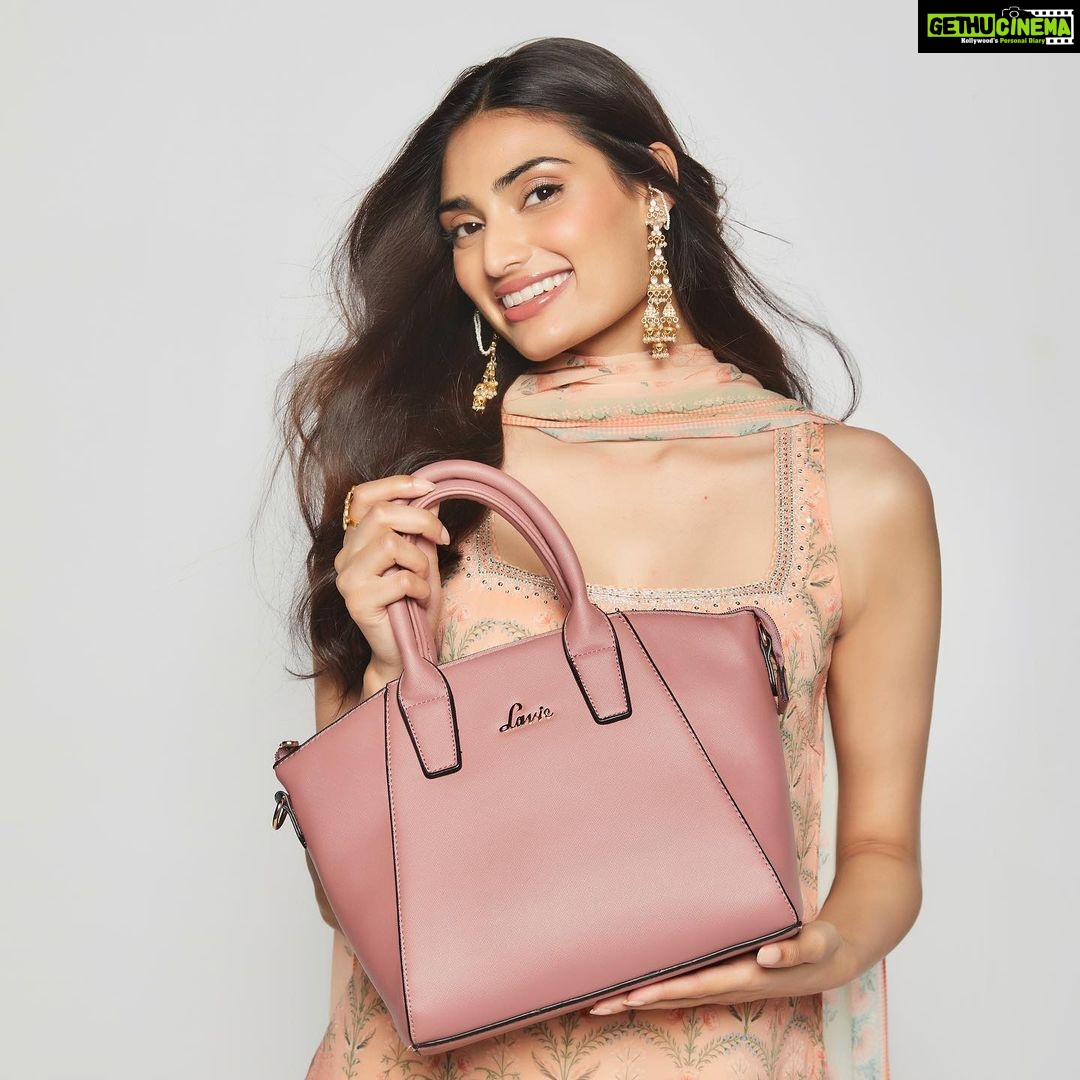 Athiya Shetty Instagram - Glamorous @lavieworld handbags completing my festive ensemble this Diwali. Get unbelievable deals on fabulous #Lavie handbags during #MyntraDiwaliSale on #Myntra #Lavieworld #lavieloving #fickleisfun #laviesport