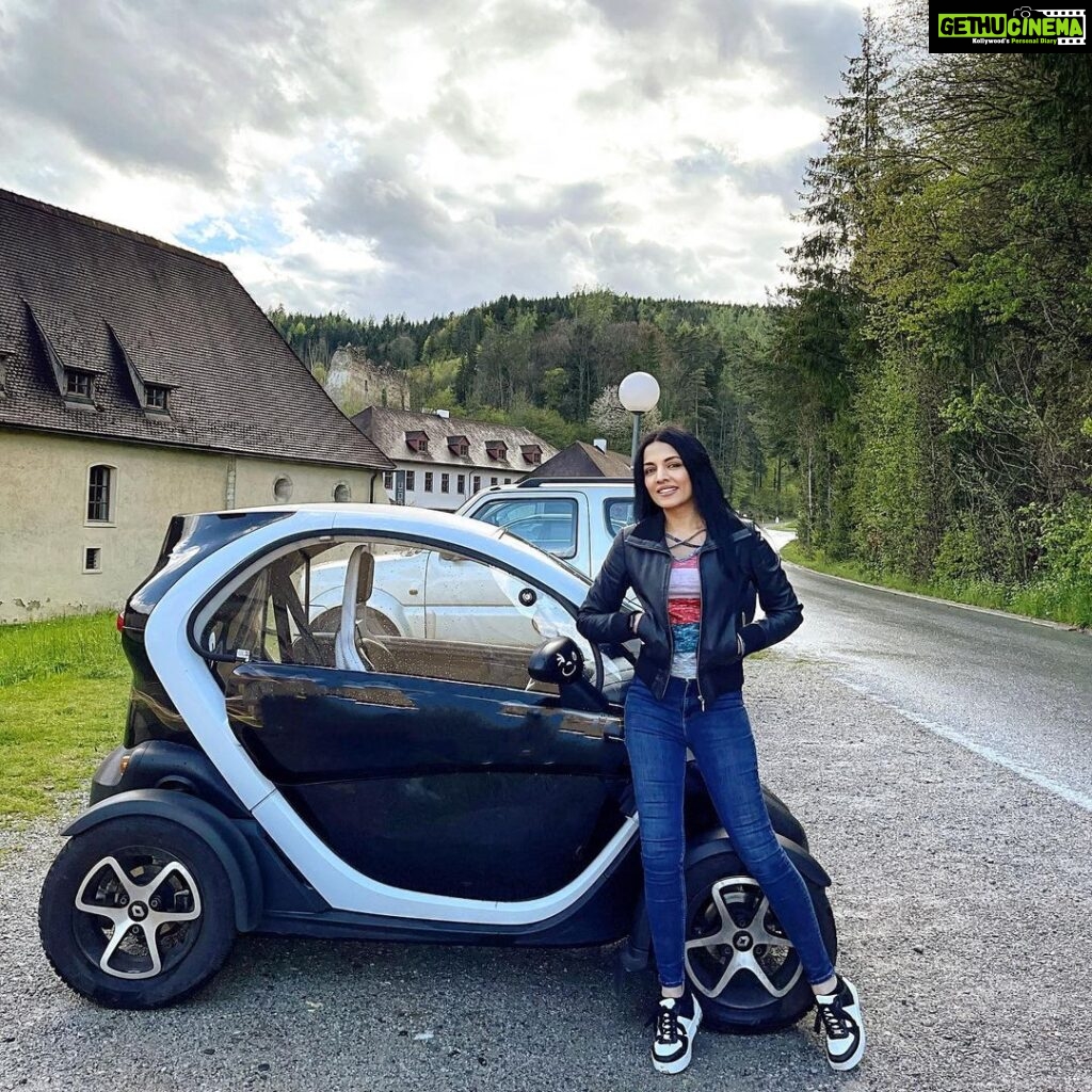 Celina Jaitly Instagram - One of the best things that I have learnt living in Austria is living with the goal of a life in agreement with nature. While I live in a scenic historic village in the very high altitude alpine area of central Austria I do often take trips to the bigger cities like Graz, Vienna & Salzburg for some “ME Time”. These historic cities have tiny beautiful lanes that tell tales of centuries and going through them is like a journey snaking through time periods, from past into present. However, the only drawback is finding a place to park. While I only feel most comfortable driving all terrain SUVs One of my favourite things to do is rent this amazing two-seat electric microcar & enjoy a day of European city pleasures while feeling good about my carbon footprint ( and finding the best parking spots) Austria is considered to be the environmental flagship of Europe and I have learnt so many wonderful things here. Not only have I grown so much in Austria, I regained my soul in its nature, Hence contributing to its fairyland nature and environment I feel like I am protecting my own soul. #celinajaitly #celinajaitley #celinainnature #austria #bollywood #twizy @renault.at Austria, Europe