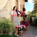 Celina Jaitly Instagram - #FromTheDeskOfCelinaJaitly MY ALPINE LIFE | AUSTRIA 16th Century home…….21st century flowers. Lord Buddha once said : If we could see the miracle of a single flower clearly our whole life would change, it’s so true because the healing and the calm I have received from living in the nature of alpine Austria has been one of the biggest blessings of my journey. Flowers are magical and whisper ‘Beauty!’ to the world, even as they fade, wilt and fall, transforming animate and inanimate all with their beauty. #austria #memoir #celina #celinajaitly #celinajaitley #alps #naturelovers #architecture #oldhouselove #oldhouse #flowers #flowerstagram #dirndl #dirndlliebe #austriangirl #indiangirl #steiermark #dirndltime Austria, Europe