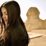 Celina Jaitly Instagram - EGYPT CALLING!! #FromTheDeskOfCelinaJaitly Prince Thutmose, son of Amenhotep II, fell asleep near the Sphinx, the story goes. In Thutmose's dream, the statue, calling itself Harmakhet, complained about its state of disarray and made a deal with the young prince: It would help him become pharaoh if he cleared away the sand from the statue and restored it. The feelings that are evoked within when one is next to the grand Sphinx are just indescribable. My deep fascination for ancient Egypt and some probable past life connections keeps me going back for more. The Sphinx has appeared yet again and my fascination deepened more than ever before, I hear the songs sung through many lifetimes maybe it’s all just a romantic fantasy or maybe it’s a modern day prophecy of the great Sphinx. #egypt #travel #travelphotography #sphinx #giza #gizapyramids #celina #celinajaitly #bollywood #celinajaitley #ancientegypt #magical