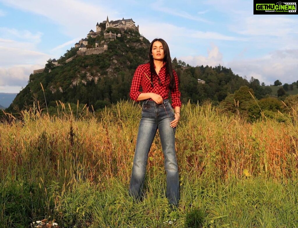 Celina Jaitly Instagram - #FromTheDeskOfCelinaJaitly MY ALPINE LIFE | AUSTRIA Every girl deserves a castle but it is up to her if she wants to be a princess who needs to be saved or a queen who got it all handled !! ~ Celina Jaitly Haag ~ This is Hochosterwitz Castle in Austria, it is considered one of Austria's most impressive medieval castles. It is on a 172-metre (564 ft) high dolomite rock near Sankt Georgen am Längsee, east of the town of Sankt Veit an der Glan in Carinthia. My boys call it the Hogwarts of Austria.. I agree, what do you think ? Photograph : @haag.peter #hochosterwitz #castle #austria #österreich #celina #celinajaitley #celinajaitly #austriangirl #indiangirl #beautyqueen #missindia #missuniverse #noentry #bollywood #european #europe #architectural #ilovearchitecture #checkshirt #castles Hochosterwitz, Kärnten, Austria