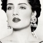 Celina Jaitly Instagram - When life looses colour don’t loose hope, the dark depths of Black and white can also be rearranged into something intensely beautiful. #celina #celinajaitly #celinajaitley #beautifulwomen #motivationalquotes #celinajaitlyquotes #blackandwhitephotography #blackandwhite #blackandwhitephoto #reels #sitar #missindia #missuniverse #photographyreels #classicphotography #bollywood #beautifulwomen #indiangirl #saree