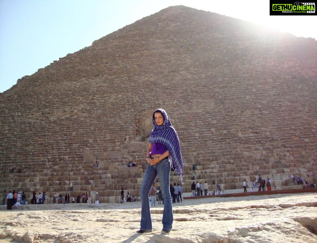 Celina Jaitly Instagram - From the height of the Pyramids... 40 centuries look down upon us !! I have always believed that I have a past life connection with #Egypt and Egyptians, the Banks of the river Nile always invokes feelings of a chance meeting with a forgotten love. #pyramid #giza #celinajaitly #celina #travel #beautifuldestination #egyptology #khufu #egyptian #ancientmonuments #bollywood #indianactress #beautyqueen #missindia #missuniverse #traveller #celinajaitley Giza pyramid complex