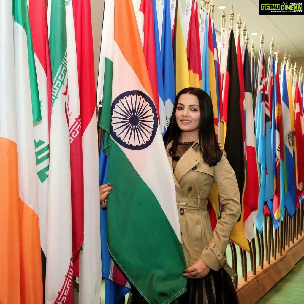 Celina Jaitly Instagram - I respect the tricolour Not to flaunt my patriotism … But because It carries in it the bravest souls of my country including my fathers !!! Always a proud moment to hug the Indian flag at United Nations HQ in New York…. HAPPY REPUBLIC DAY !! #republicdayindia #republicday #happyrepublicday #bollywood #unitednations #celinajaitly #celinajaitley #missindia #missuniverse #bollywood #indianflag #tiranga #newyork #un United Nations Headquarters