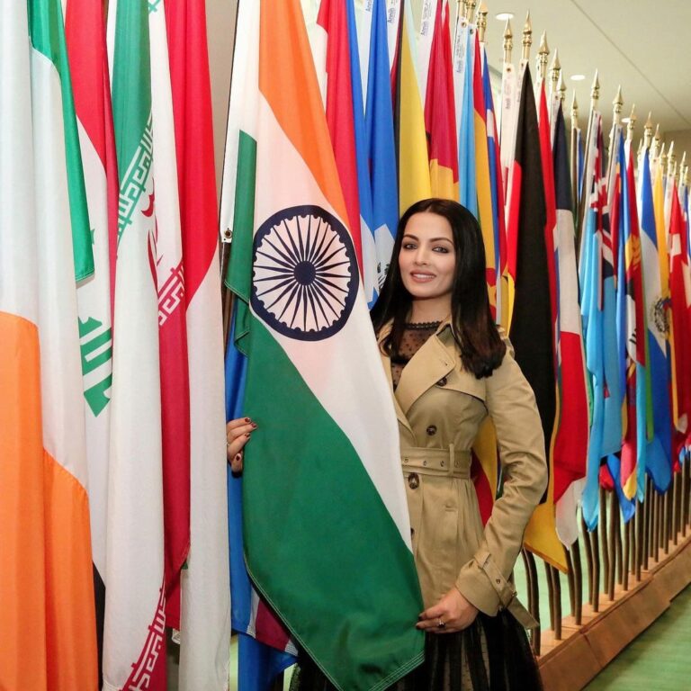 Celina Jaitly Instagram - I respect the tricolour Not to flaunt my patriotism … But because It carries in it the bravest souls of my country including my fathers !!! Always a proud moment to hug the Indian flag at United Nations HQ in New York…. HAPPY REPUBLIC DAY !! #republicdayindia #republicday #happyrepublicday #bollywood #unitednations #celinajaitly #celinajaitley #missindia #missuniverse #bollywood #indianflag #tiranga #newyork #un United Nations Headquarters