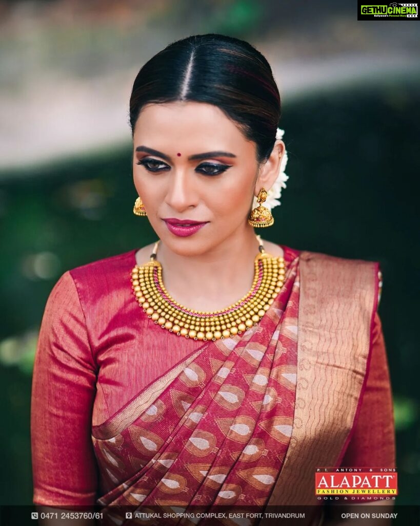 Dhanya Mary Varghese Instagram - Let's brighten your Instagram feed today with the gorgeous @dhanya_maryvarghese wearing one of our unique gold necklace. We are taking this opportunity to invite you to our showroom this month and stand a chance to win some amazing gifts!! Celebrate this Onam with your favourite Alapatt Fashion Jewellery, Trivandrum. . . . . . #dhanyamaryvarghese #alapattfashionjewellerytrivandrum #goldnecklace #goldearrings #onamoffer #onam2022 #celebrityshoot #celebrityphotoshoot #modelphotography #product #productphotography #keralamodel #bestintrivandrum