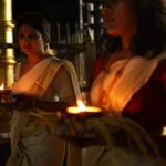 Gayathri Arun Instagram - Happiness is celebrating our roots and traditions with family in a traditional outfit 😍 #traditional #templefestival Jewellery @abharanashaala Cherthala Karthyayani Devi Temple