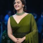 Honey Rose Instagram - The color of mother earth. @honeyroseinsta The lady who shines like a diamond 💚. saree @doja_design_story @dona_kj MUA @sreshtamakeup Accessories @anokhi_priyakishore photography @vishnuprathapvp